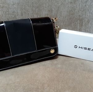 Isaac Mizrahi womans wristlet